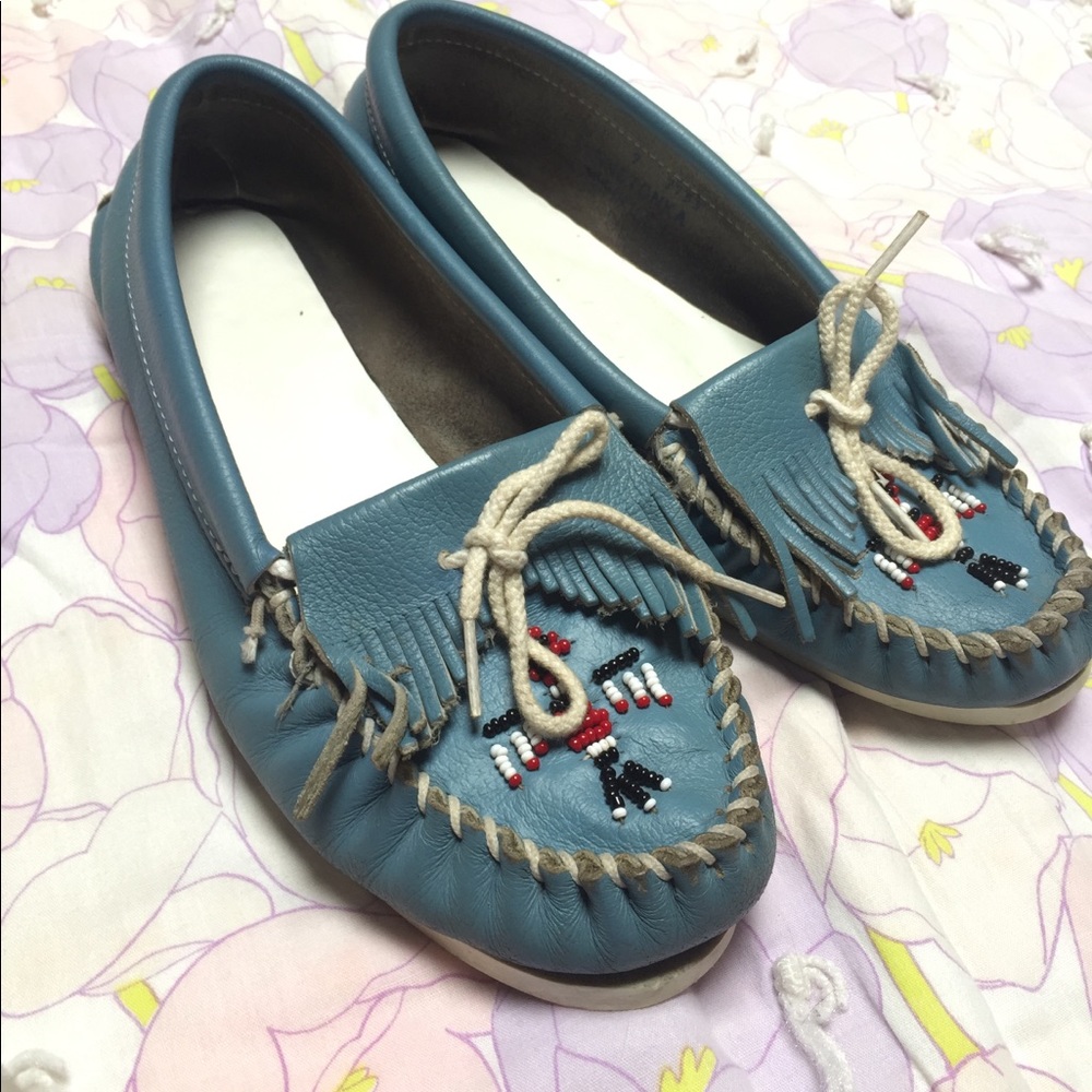Minnetonka moccasin. size 9-10.  sky blue. Used.